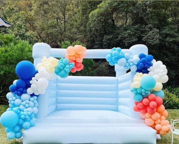 Bouncing Castle Rental 4x4m with Pit Balls and Balloon Decor Blue, Yellow, White, Peach and Red - Perfect for Kids Birthday!