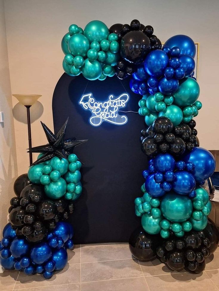 Customizable Board Backdrop with LED Acrylic 'Congrats Grad' and Balloons Black, Chrome Blue, Chrome Green with Starburst accents - Perfect for any celebration!