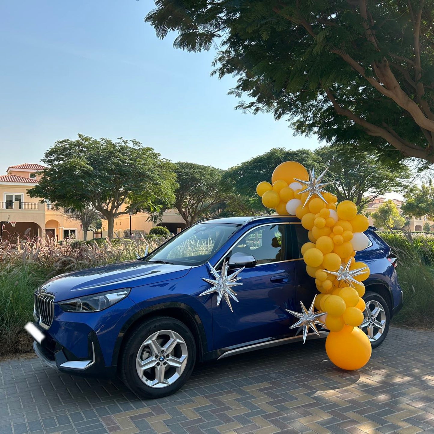 Car Surprise Balloon Design in Yellow, White and Silver Star Accents – Perfect for Any Celebrations
