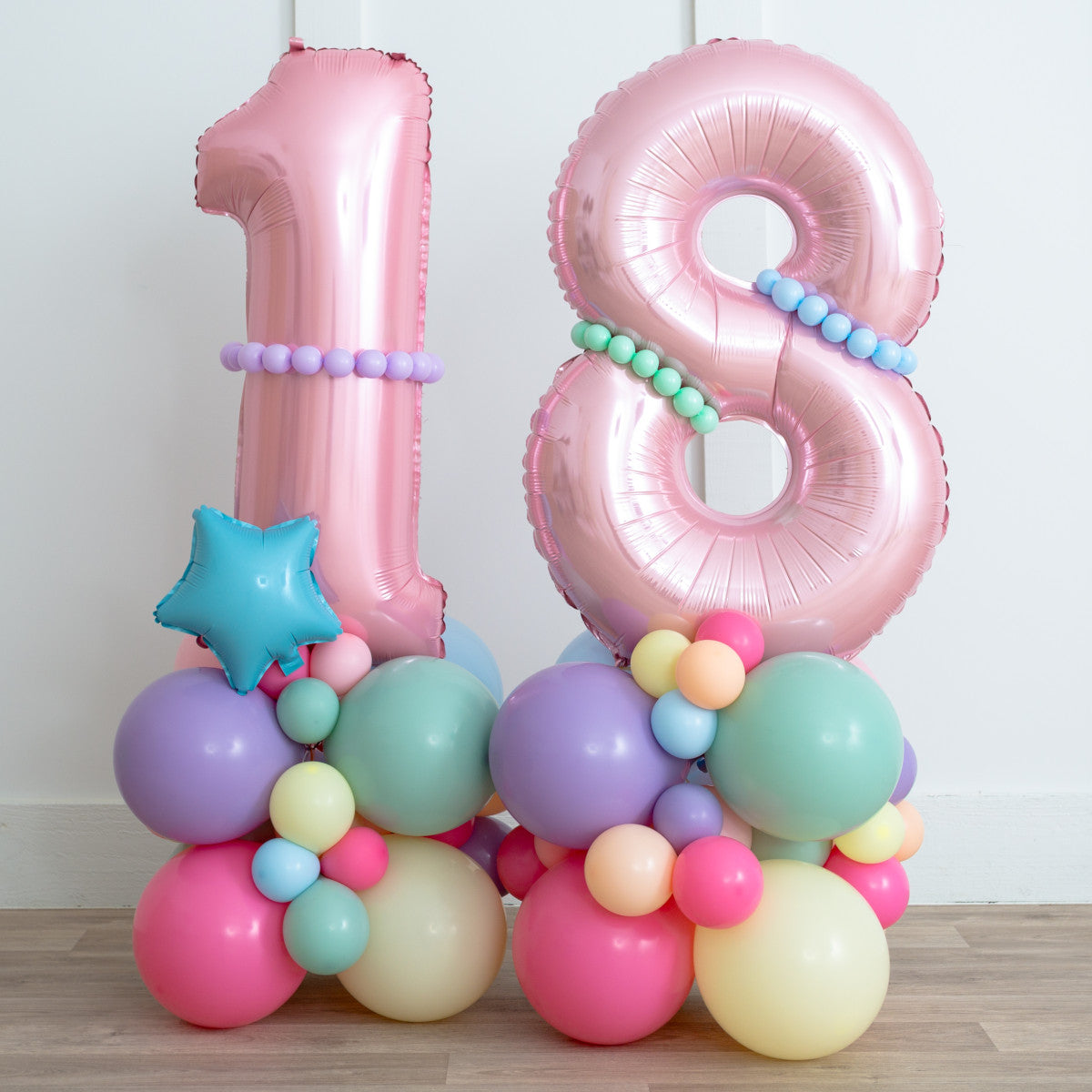 Pink, Blue, Purple, Green and Yellow Number Balloon on Stand '18' with Star Accents - Customizable and Balloon Design