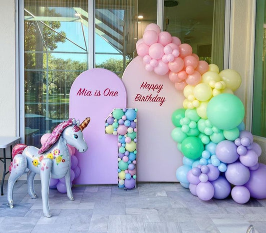 Full Set Customizable Board Backdrop with Balloons Pink, Peach, Yellow, Green and Purple with Unicorn Self-Standing Balloon and Number ‘1’ Standee Filled with Balloons Setup - Perfect for special occasions