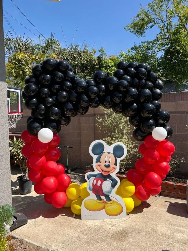 Mickey Mouse-Themed with Balloons Black, Read, Yellow and White Shaped as Mickey Mouse with Mickey Mouse Standee Decor Setup - Perfect for special occasions