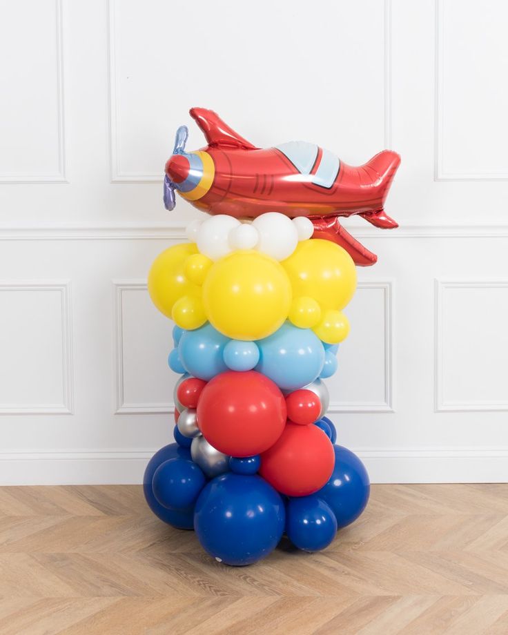 Plane Balloon on Stand White, Yellow, Blue, Red and Silver Aircraft-Themed Decor – Soar Into Celebration!