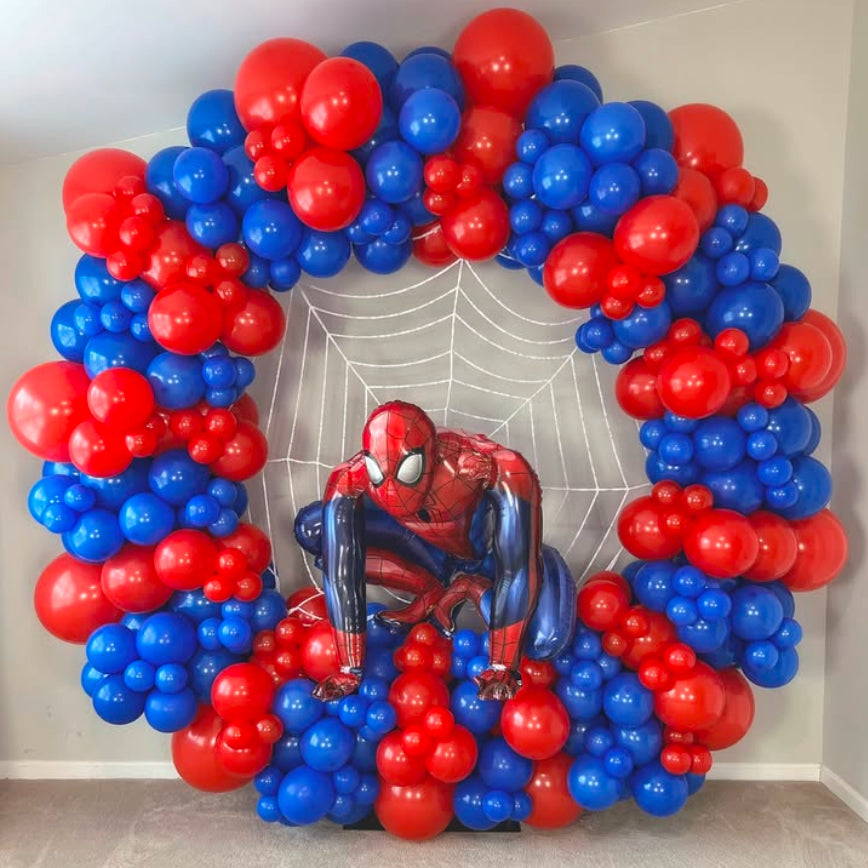 Spiderman-Themed Round Balloon Red and Blue Chain with Self Standing Spiderman Decor Setup - Perfect for Birthday Celebrations