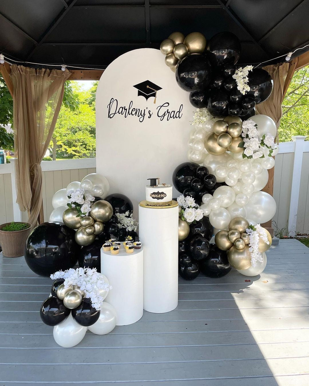 Customizable KT Board Backdrop with Balloon Pearl White, Light Gold, Gold and Black Graduation Balloon with White Cake Stand Setup - Perfect for Graduation Celebration