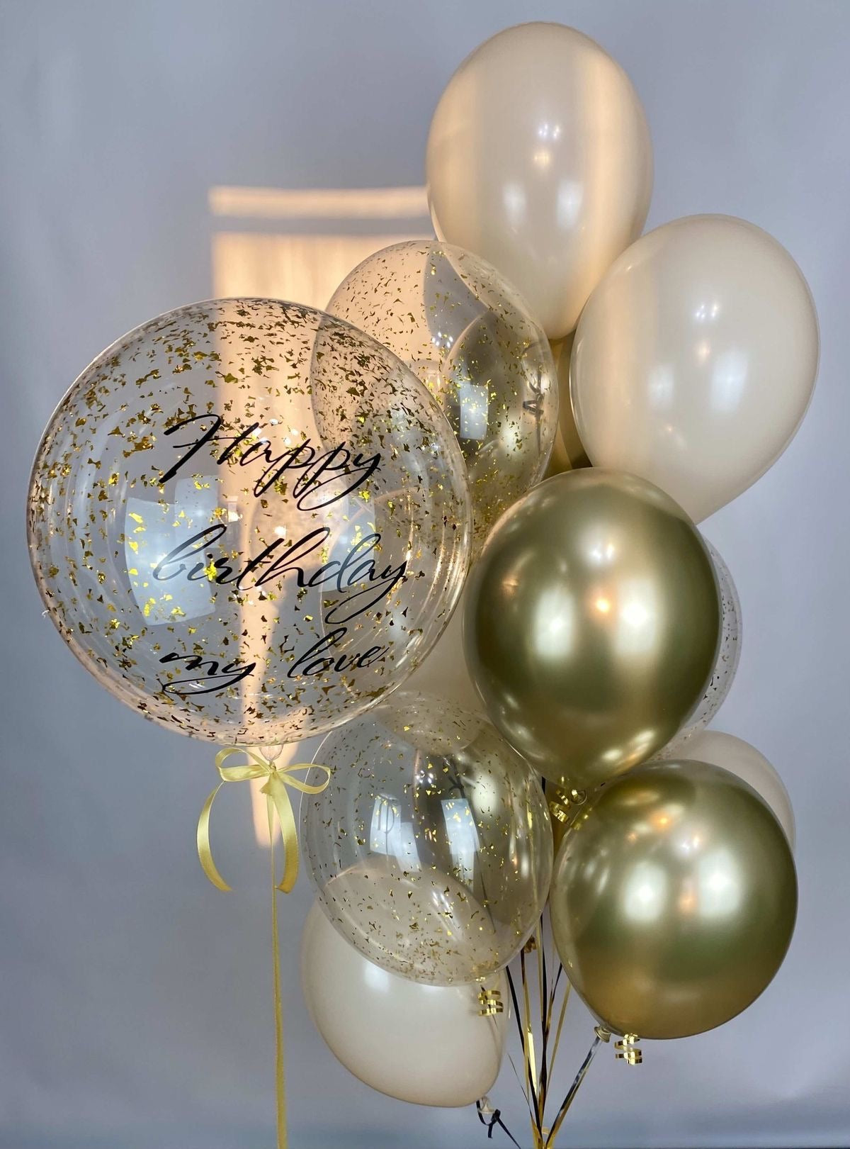 Personalised Helium Balloon Bobo with Customizable Sticker, Tassels, and Helium Sand White, Clear with Confetti and Light Gold Balloons