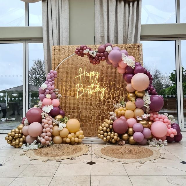 Gold Shimmer Wall with LED Acrylic ‘Happy Birthday’ Setup with Balloon Maroon, Purple, Pink and Gold Decor with Flowers - Perfect for any Celebration