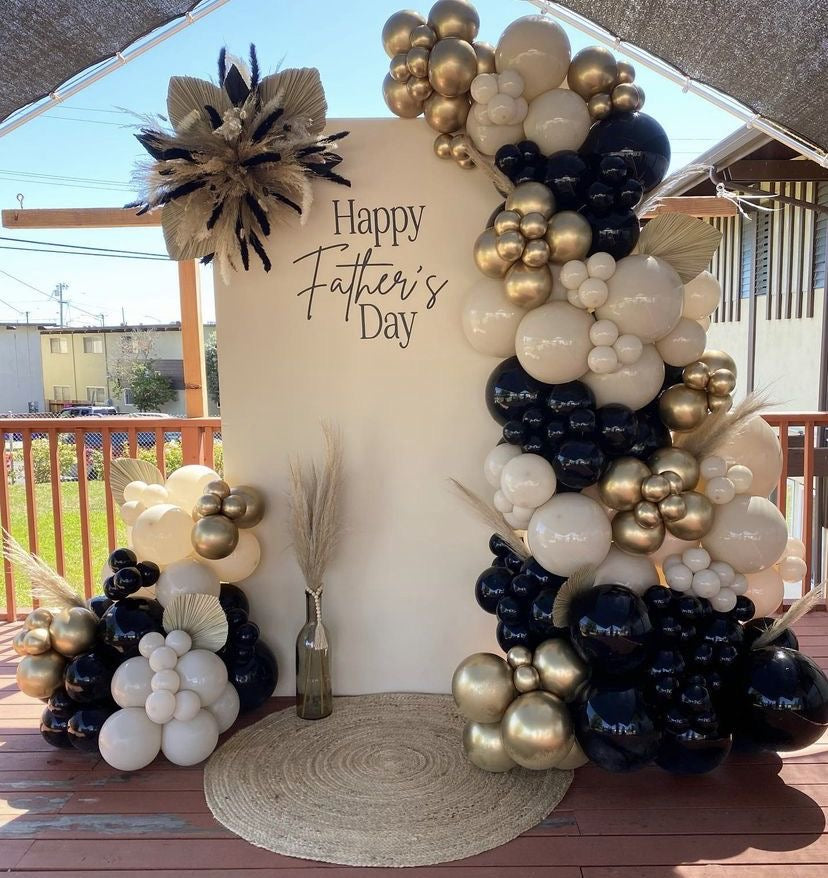 Customizable KT Board Backdrop with Balloon Dust White, Black and Light Gold with Artificial Flower Decor Setup - Perfect for Father’s Day Celebration