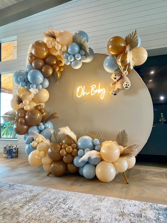 Customizable Round KT Board with Balloon Blue, Brown and Beige and Teddy Bear, Artificial Leaves Decor with LED Acrylic “Oh Baby” Lights Setup - Baby Shower Perfect for special occasions
