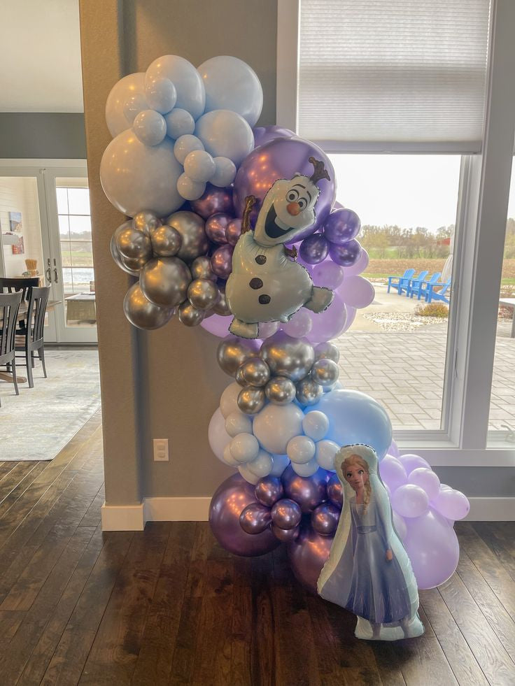 Frozen-Themed Balloon Blue, Purple and Silver Decor Setup with Olaf and Elsa Foil Balloons Accents - Perfect for Birthday Celebrations