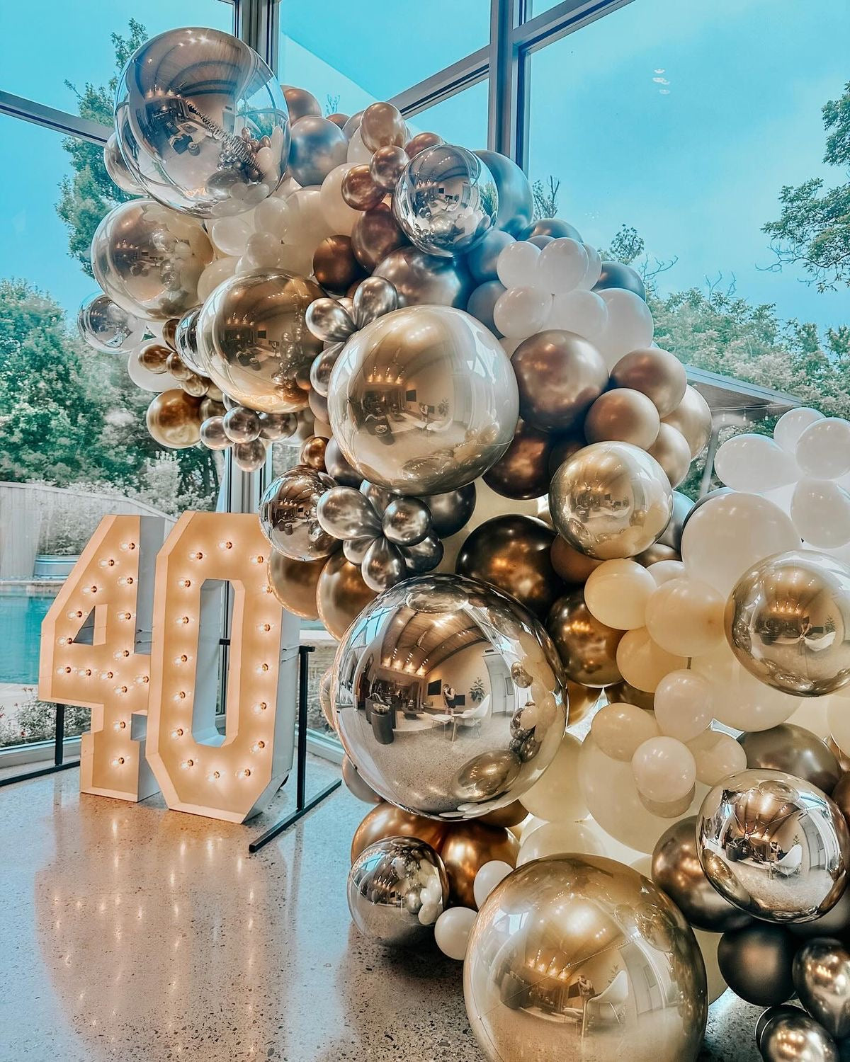 Customizable Organic Balloon Chain White, Light Gold and Silver with Orbs Accents and LED Marquee ‘40’ Number Decor Setup - Perfect for special occasions