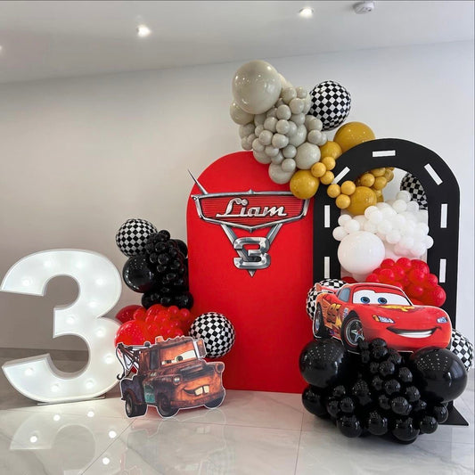 Customizable Backdrop with Balloons Yellow, Dust White, White, Red and Black with Cars Character and Disco Ball Foil Accents and LED Marquee Number ‘3’  - Cars-Themed Perfect for special occasions