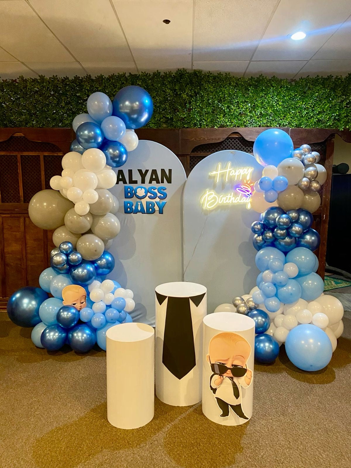 Customizable Backdrop with Balloons Chrome Blue, Blue, White and Gray with Baby Boss Standee Accents with LED Acrylic ‘Happy Birthday’ Lights and White Cake Stand - Boss Baby-Themed Perfect for special occasions