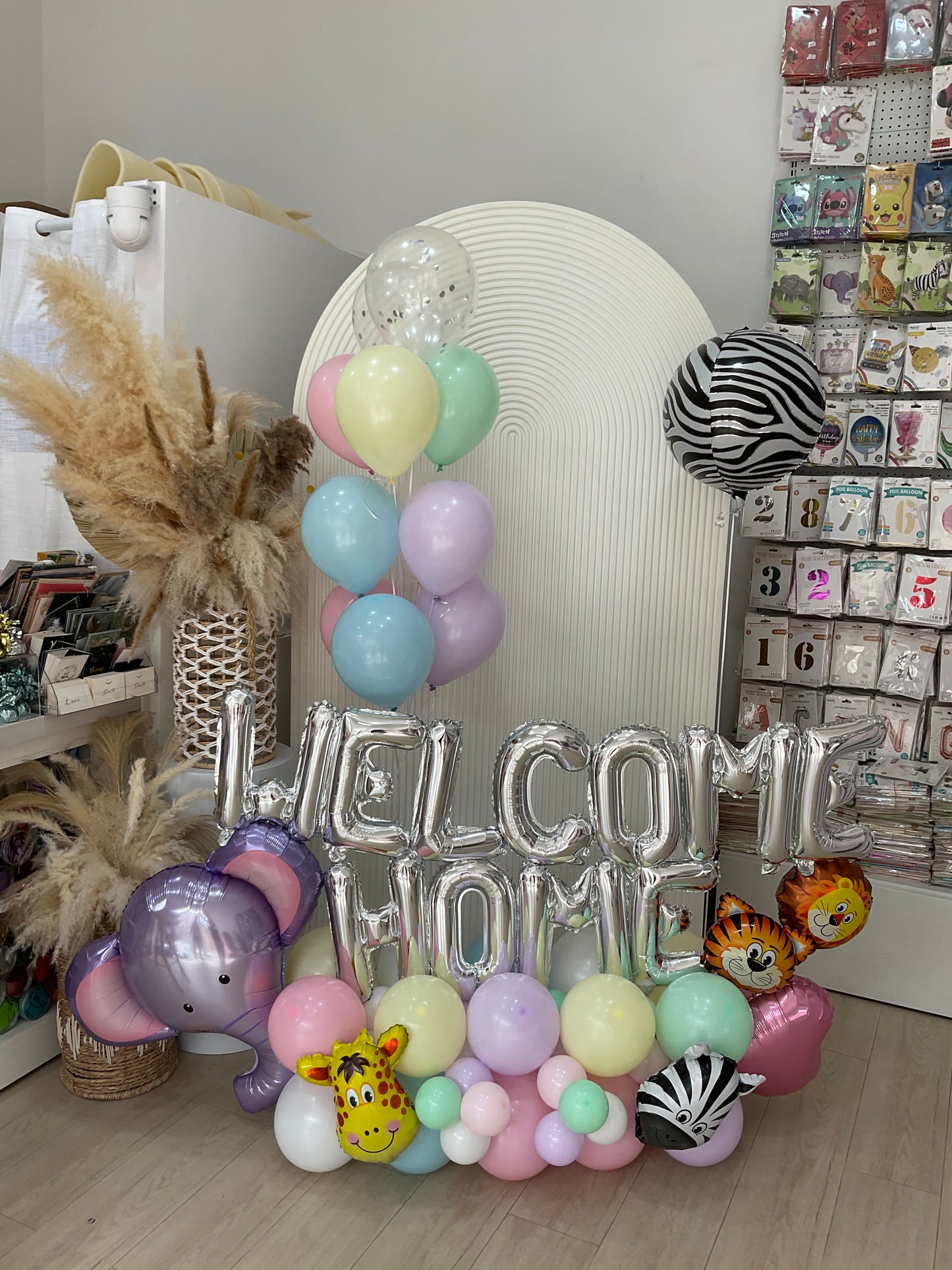 Platform Silver 'WELCOME HOME' Balloons Pastel Colors Yellow Pink Purple Blue Green Animal Safari Jungle-Themed Elephant Zebra Lion Tiger Giraffe – Customizable Design
