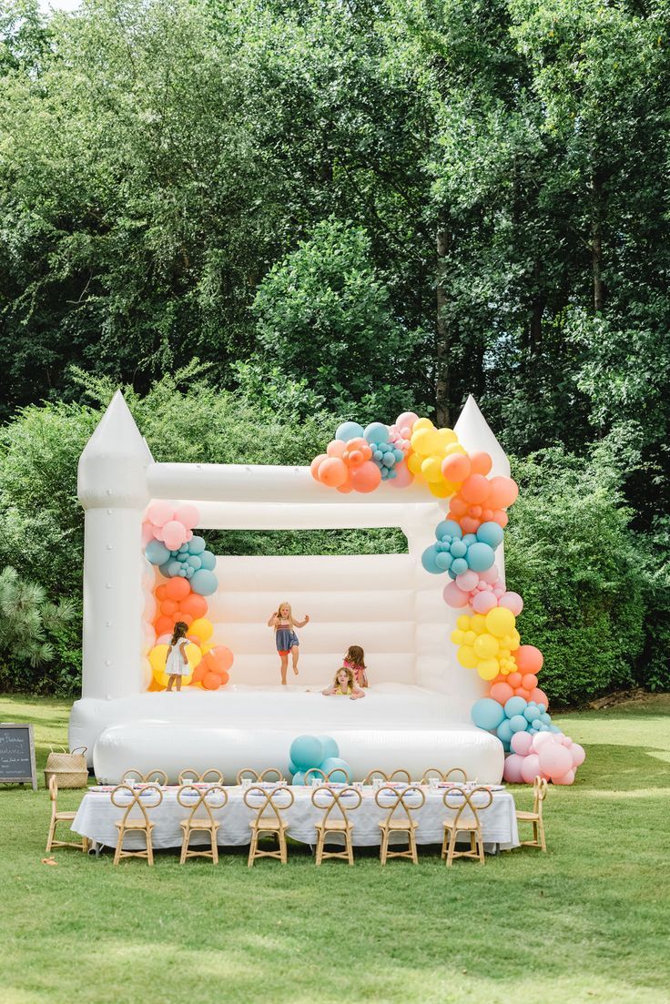 Bouncing Castle Rental 4x4m with Pit Balls and Balloon Decor Pink, Yellow, Blue and Peach - Perfect for Birthday!