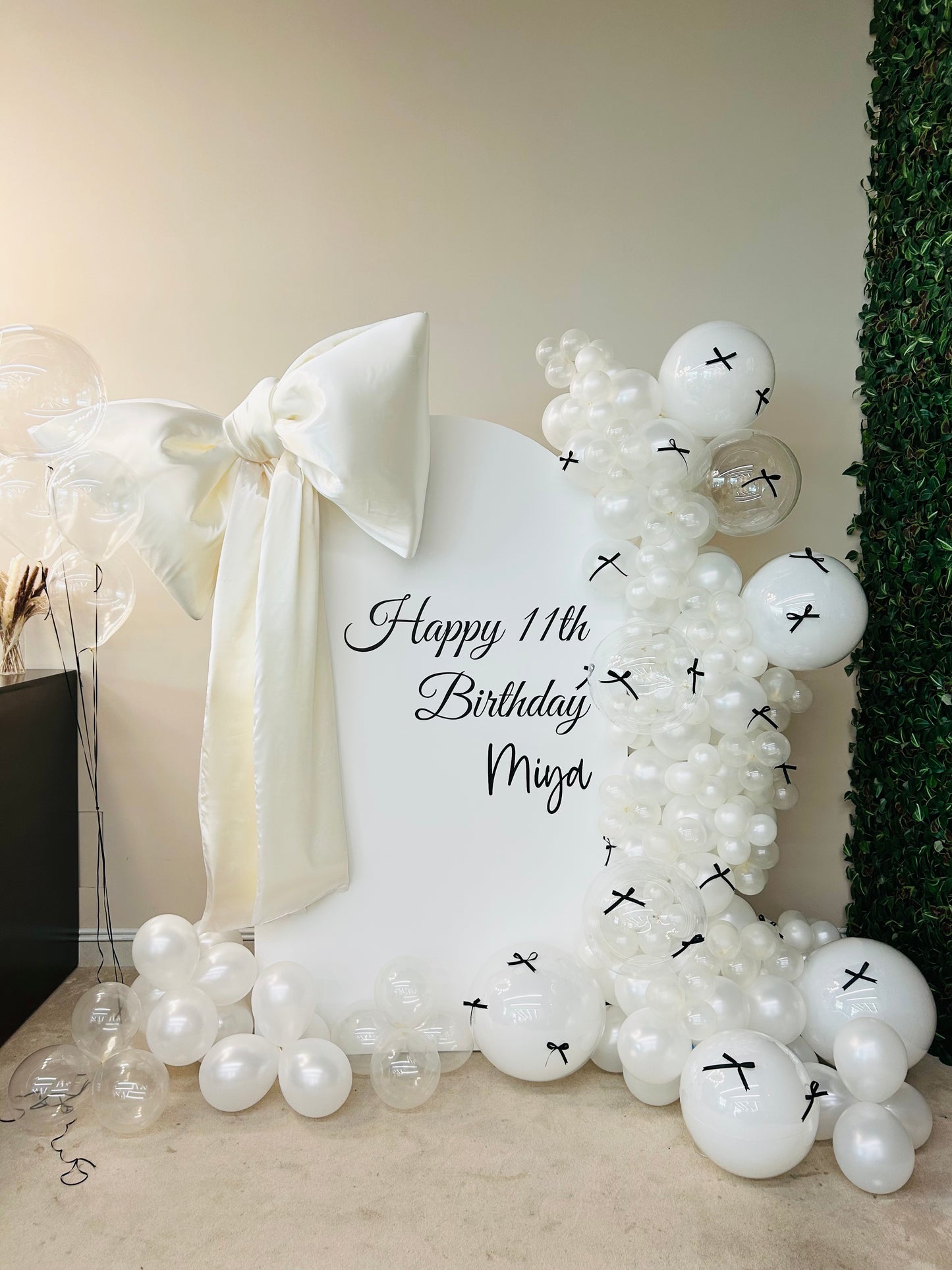 Customize Backdrop with Big Customize Ribbons and Balloon Decor White, Pearl White and Clear with Black Ribbons accents and Helium Clear Balloon Bunch - Perfect for special occasion