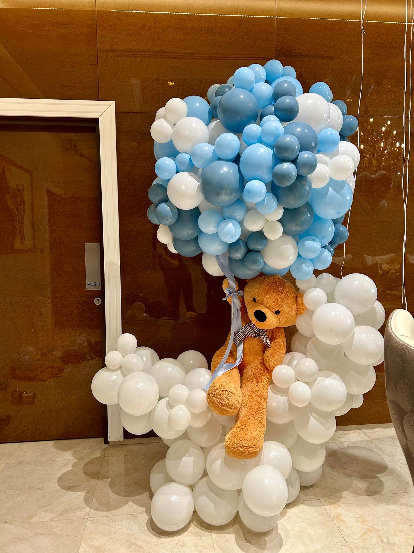 Hospital Welcoming Baby Balloon White and Blue Cloud-Themed Decor Setup with Teddy Bear - Perfect for special occasions