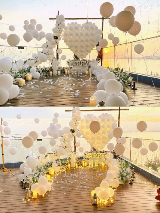 Artificial Flowers and Petals, Candles, LED Marquee ' MARRY ME', Designed White Heart Balloons and Helium Balloons - Perfect for Proposal, Wedding, Anniversary special occasions!