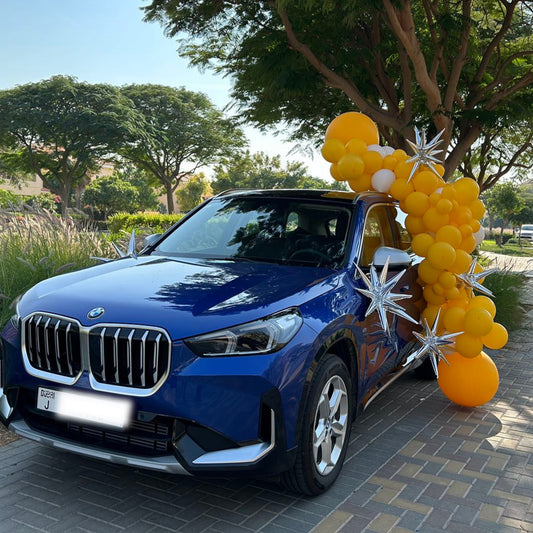 Car Surprise Balloon Design in Yellow, White and Silver Star Accents  – Perfect for Any Celebrations