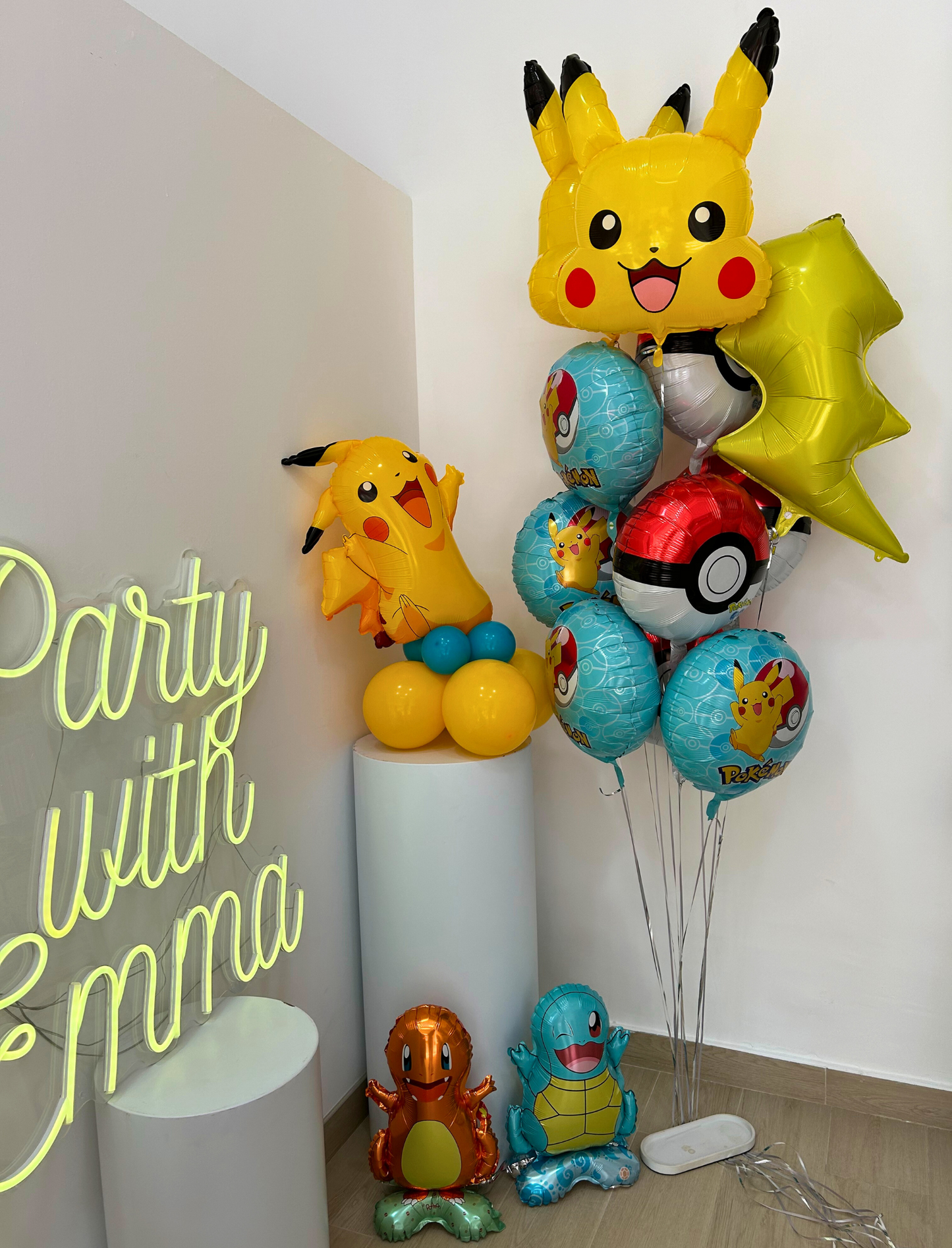 Pokémon-Themed Party with Our Exclusive Balloon Set, Featuring a Full-Size Pikachu Balloon on a Balloon Stand, an Adorable Pikachu Face Balloon, Iconic Pokéball Helium Balloons, and Charmander and Squirtle Balloons Bouquet