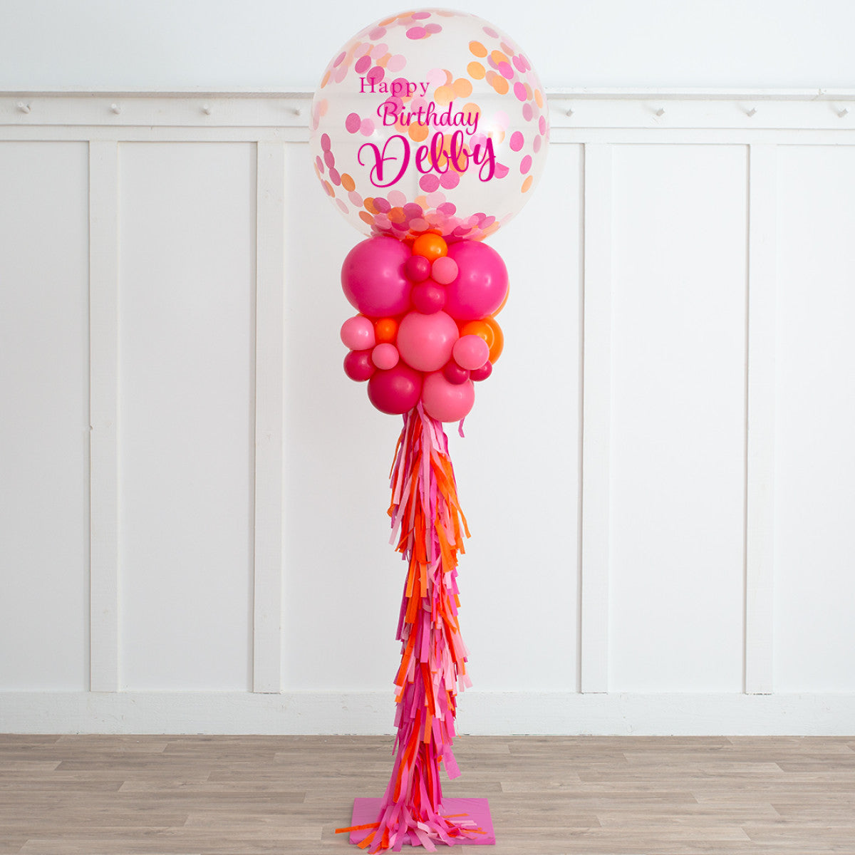 Personalised Clear Balloon with Different Shade of Pink and touch of Orange Confetti and Balloon with Tassels Accents Pillar/Column/Tower – Perfect for Any Celebrations