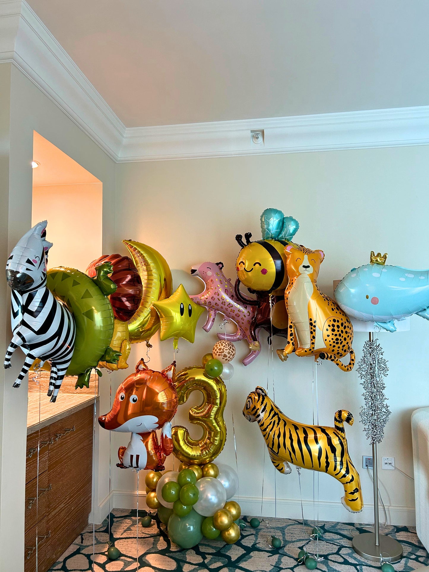 Safari Animals Number Stand with Animal Print Balloon Design and Animal Helium Balloons with Star and Moon Accents - Perfect for Any Safari Themed Celebrations