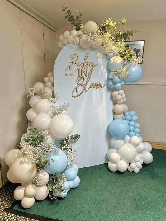 Customizable Board Backdrop with Acrylic Customize 'Baby in Bloom' and Balloons Blue, White and Beige with Artificial Flowers and Leaves - Perfect for any celebration!