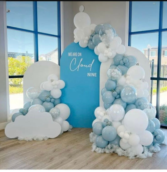 Customizable Board Backdrop with White, Clear Balloons 'We are on Cloud Nine', Cotton and Artificial Flowers - Perfect for 9th Birthday Celebration!