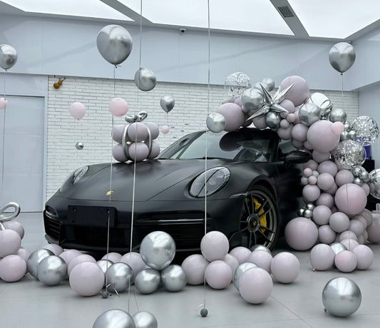 Car Surprise Balloon Design in Matte Silver, Soft Pink, and Chrome Accents – Perfect for Any Sleek and Elegant Celebrations