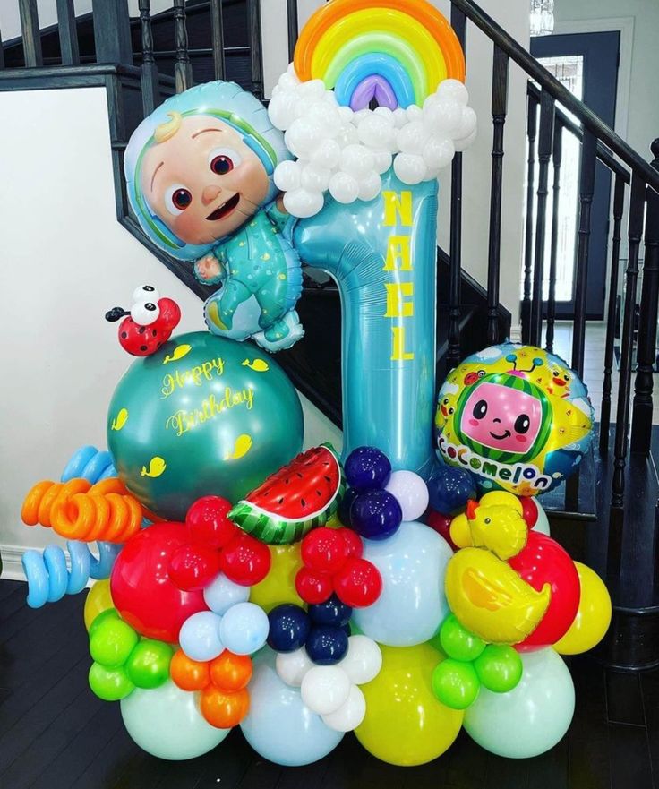 Platform Blue Number '1' with Latex Blue, Green, and Red with Customize Sticker, Cocomelon and Designed Rainbow Balloons accents – Cocomelon-Themed Customizable Design