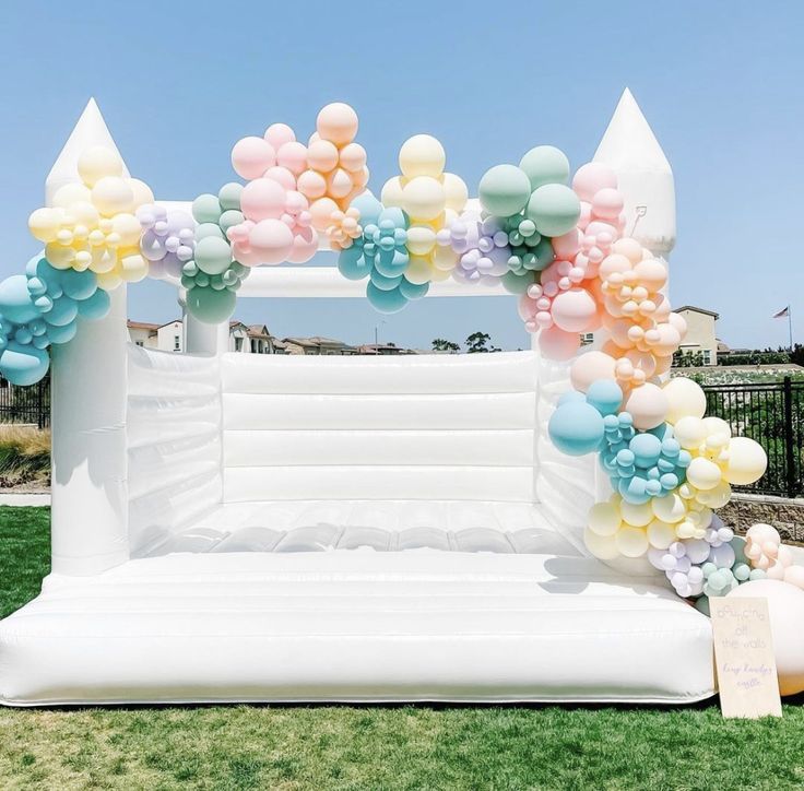 Bouncing Castle Rental 4x4m with Pit Balls and Balloon Decor Purple, Pink, Green, Yellow and Peach - Perfect for Kids Birthday!