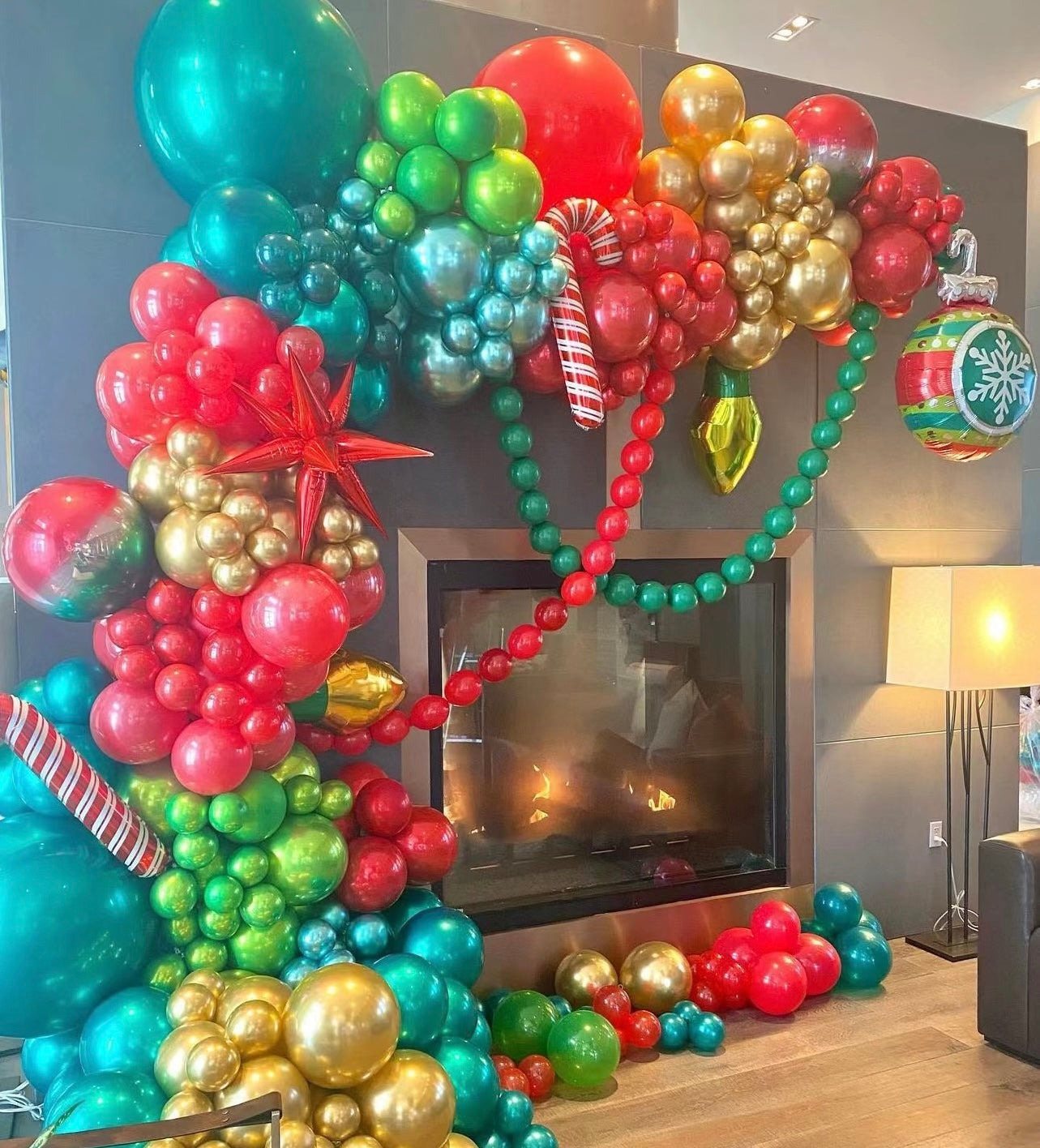 Christmas Balloon Garland with Candy Canes, Metallic Balloons, Star Decorations, and Red, Green, and Gold Ornament Accents