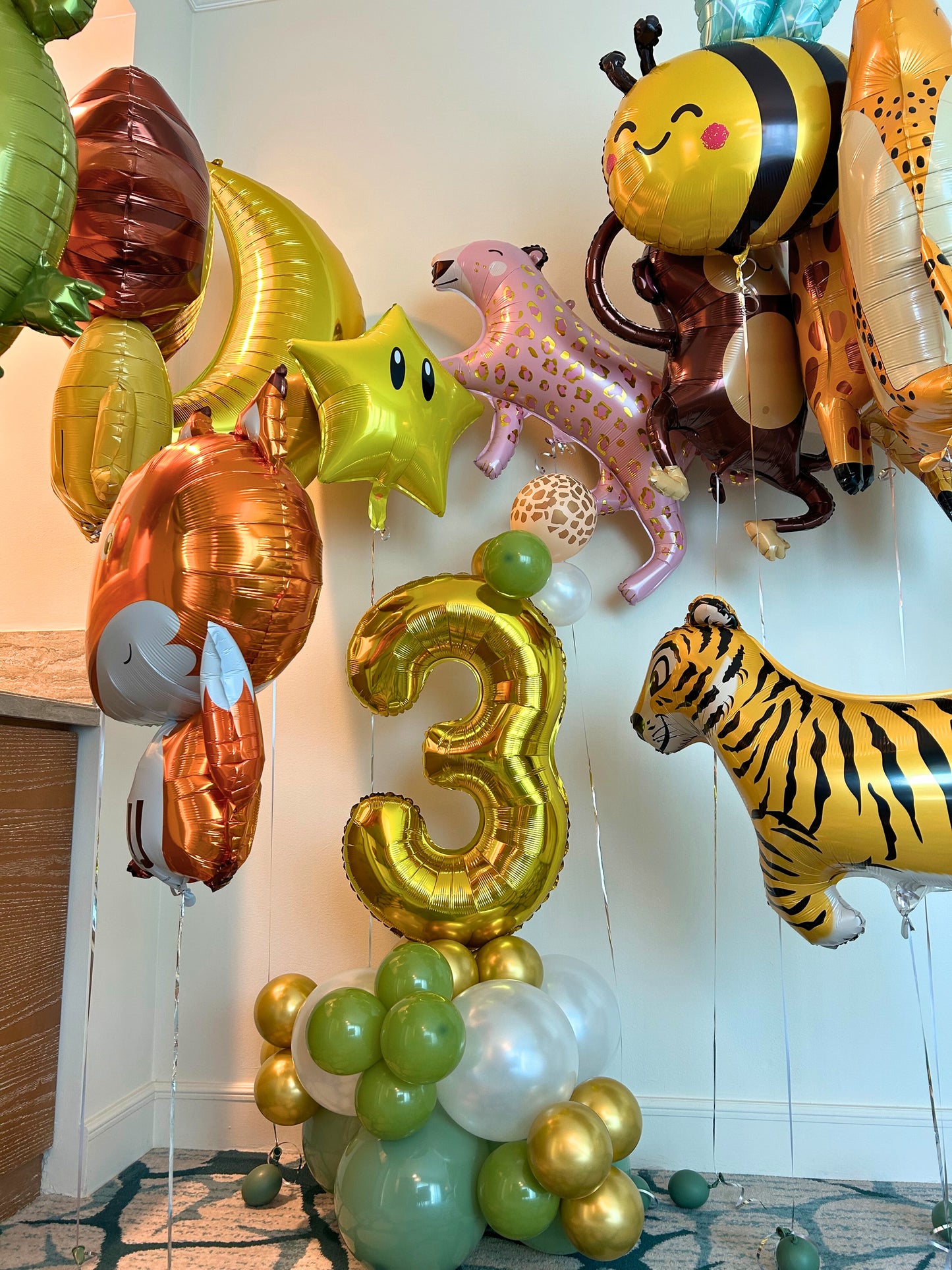 Safari Animals Number Stand with Animal Print Balloon Design and Animal Helium Balloons with Star and Moon Accents - Perfect for Any Safari Themed Celebrations