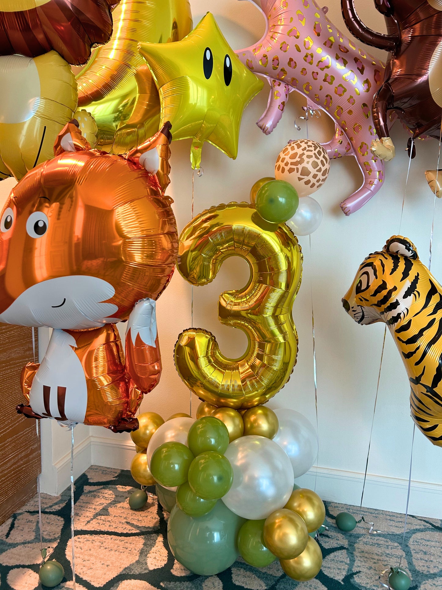 Safari Animals Number Stand with Animal Print Balloon Design and Animal Helium Balloons with Star and Moon Accents - Perfect for Any Safari Themed Celebrations