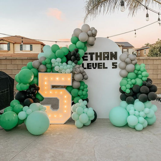Customizable Board Backdrop with Balloon Green, Silver and Black with LED Marquee ‘5’ - Minecraft-Themed Perfect for special occasion