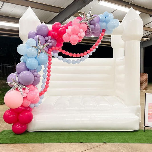 Bouncing Castle Rental 4x4m with Pit Balls and Balloon Decor Purple, Pink and Blue with Starburst accents - Perfect for Kids Birthday!