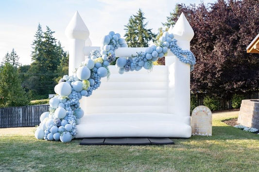 Bouncing Castle Rental 4x4m with Pit Balls and Balloon Decor Blue with Artificial Leaves and Flowers accents - Perfect for Kids Birthday!