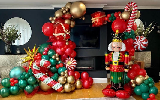 Christmas Balloon Garland with Ornaments, Candy Canes, Metallic Balloons, Star Accents, and Festive Red, Green, and Gold Design