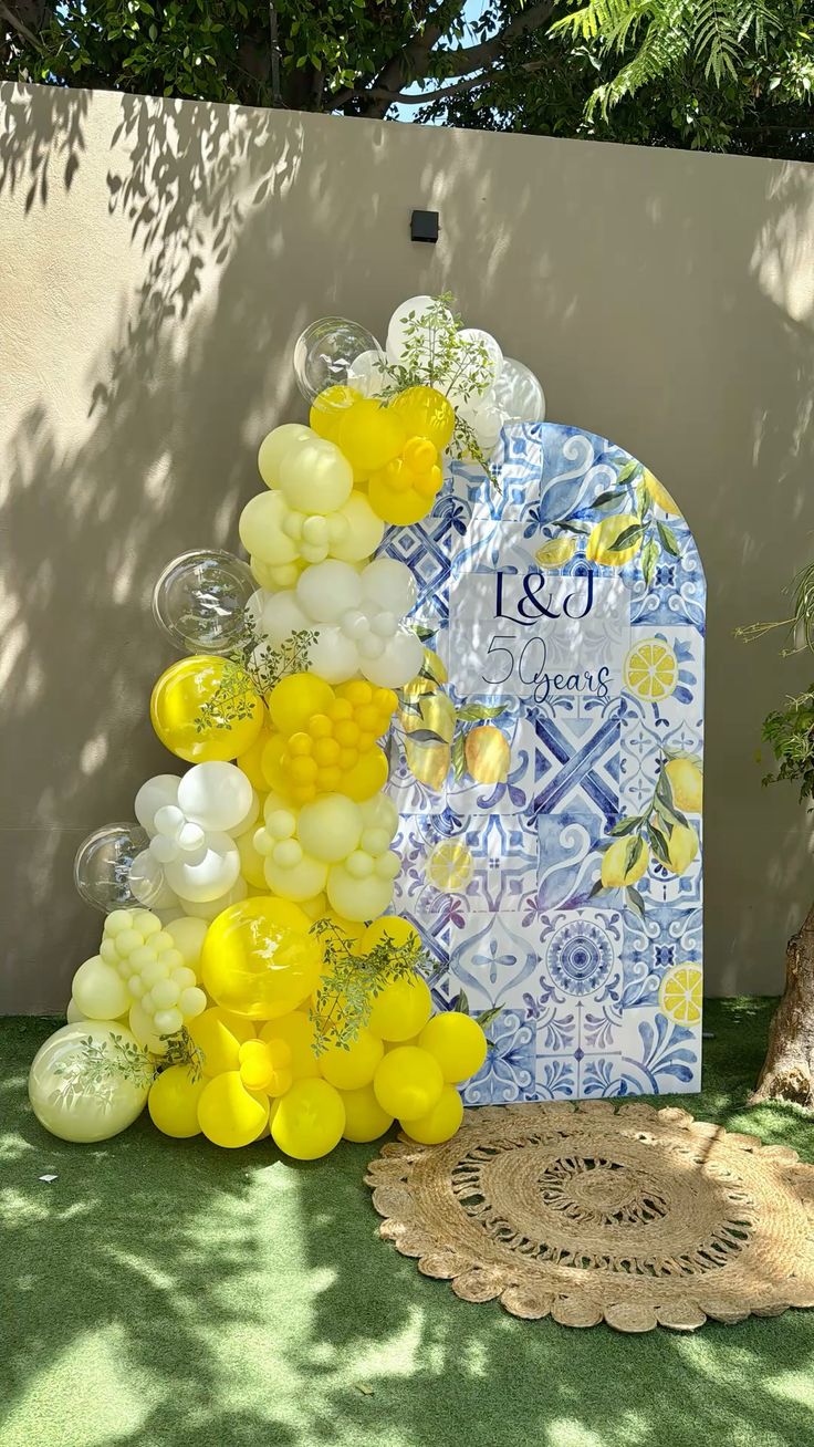 Customizable Board Backdrop with Balloon Yellow, White and Clear with Artificial Leaves - Perfect for special occasion