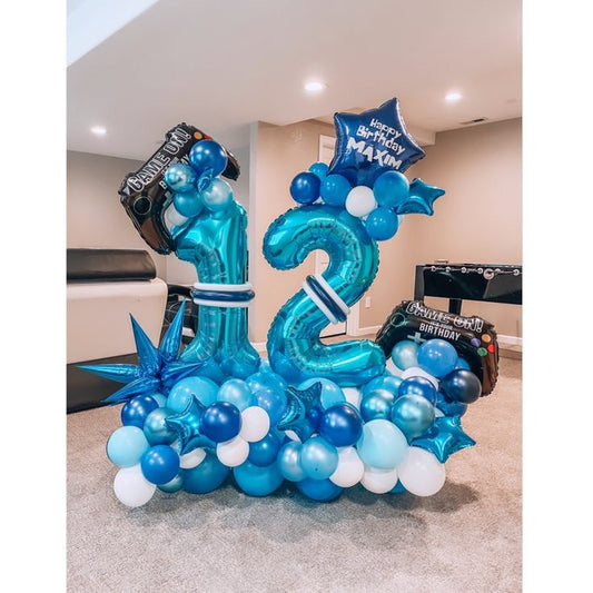 Blue Number Platform ‘12’ with Blue, Shinny Blue and White with Game Controller Foil, Star with Customize Sticker and Starburst accents Balloons – Customizable Design