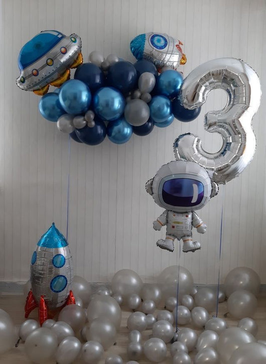 Mini Balloon Chain Colors Blue, Chrome Blue and Gray with Mini UFO and Rocket Accents and Helium Single Number Set Silver Number ‘3’, Astronaut and Floor Balloons with Self Standing Rocket  - Galaxy-Themed Perfect for special occasions