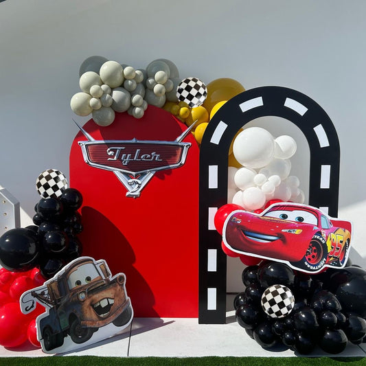 Customizable Backdrop with Balloons White, Yellow, Red, Gray and Black with Cars Character, Wheels and Checkered Ball Foil Accents - Cars-Themed Perfect for special occasions