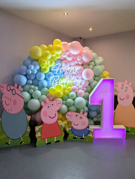 Round Balloon Wall Pink, Green, Purple, Yellow, Clear and Blue with LED Acrylic ‘Happy Birthday’ Lights, LED Marquee ‘1’ and Peppa Pig Characters Standee - Peppa Pig-Themed Perfect for special occasions