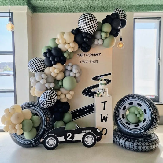 Customizable Board Backdrop and Balloon Black, Gray, Beige and Green with Wheels and Checkered Foil Balloons Accents, Car Standee and White Cake Stand - Car-Themed Perfect for special occasions