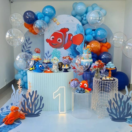 Customizable Board Backdrop with Balloons Blue and Orange with Clear Balloon Heliums and Acrylic Cake Stand - Nemo-Themed Perfect for special occasions