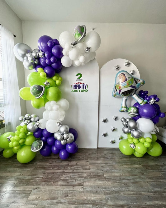Customizable Board Backdrop with Balloons White, Green, Silver Purple and Mini Silver Stars accents and Buzz Lightyear Balloon - Toy Story-Themed Perfect for special occasions