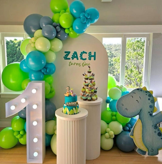 Customizable Board Backdrop with Balloon Blue and Green with Dinosaur Standee, Cake Stand and LED Marquee ‘1’ Number - Dinosaur-Themed Perfect for special occasion
