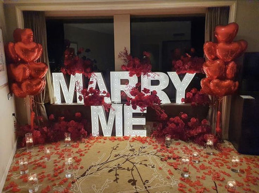Artificial Flowers and Petals, LED Marquee 'MARRY ME', Candles and Hearts Helium Bunch Balloons - Perfect for Proposal, Wedding, Anniversary special occasions!