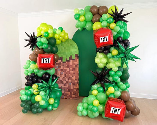 Customizable Board Backdrop with Balloon Different Shades of Green and Brown with Printed Red Square Orbs and Black Starburst accents - Minecraft-Themed Perfect for special occasion!