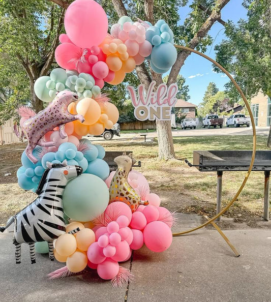 Round Stand with Organic Balloon Arrangement Blue, Green, Purple, Pink and Orange with Animal Foil Cheetah, Giraffe and Zebra Balloons and Customize 'Wild One' - Perfect for special occasion